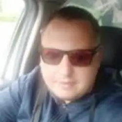 Роман Могильник